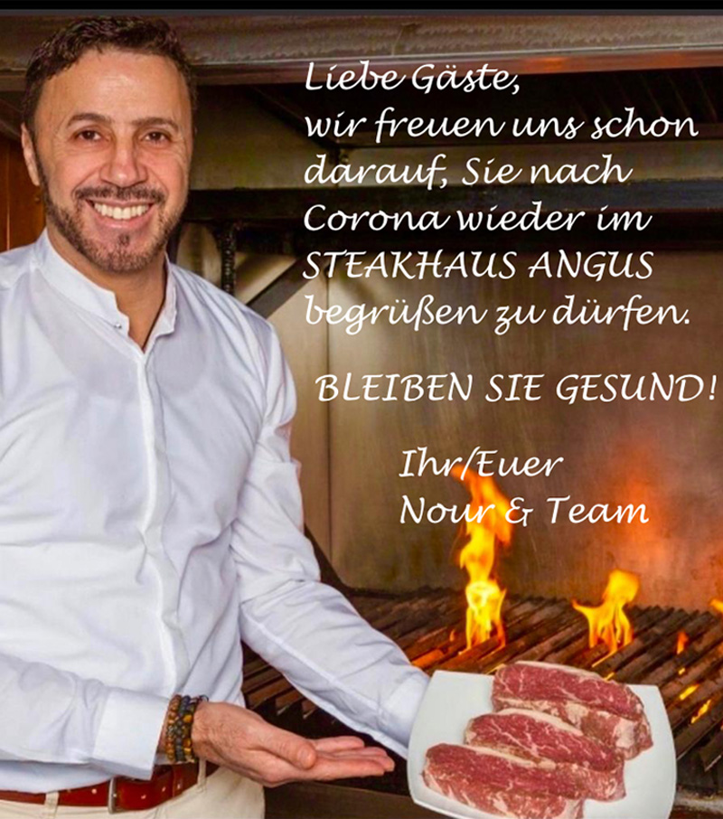 Inhaber Nour Ouahim vor dem Holzkohlegrill